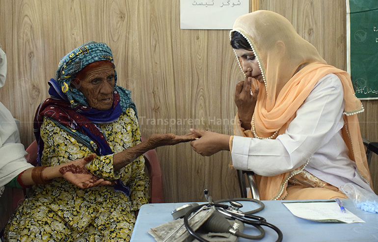 doctor checking patient