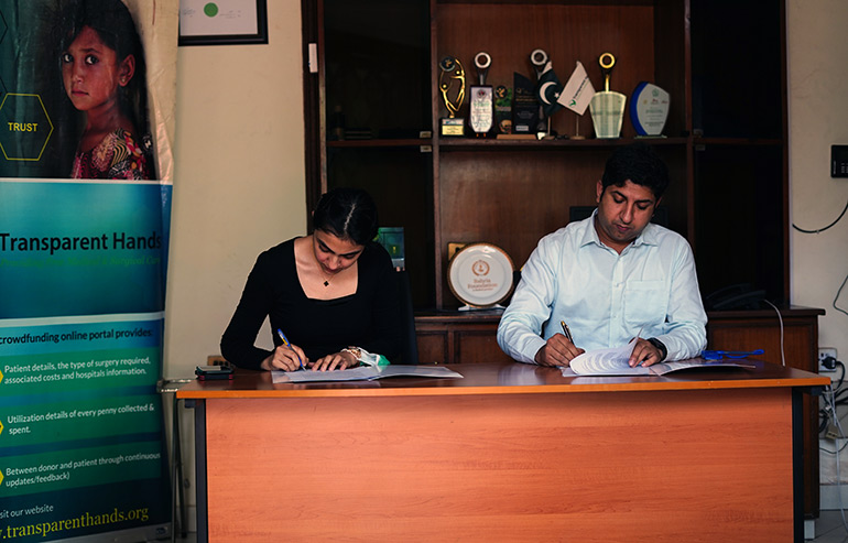 Transparent Hands and Eye on Ivy Sign an MoU